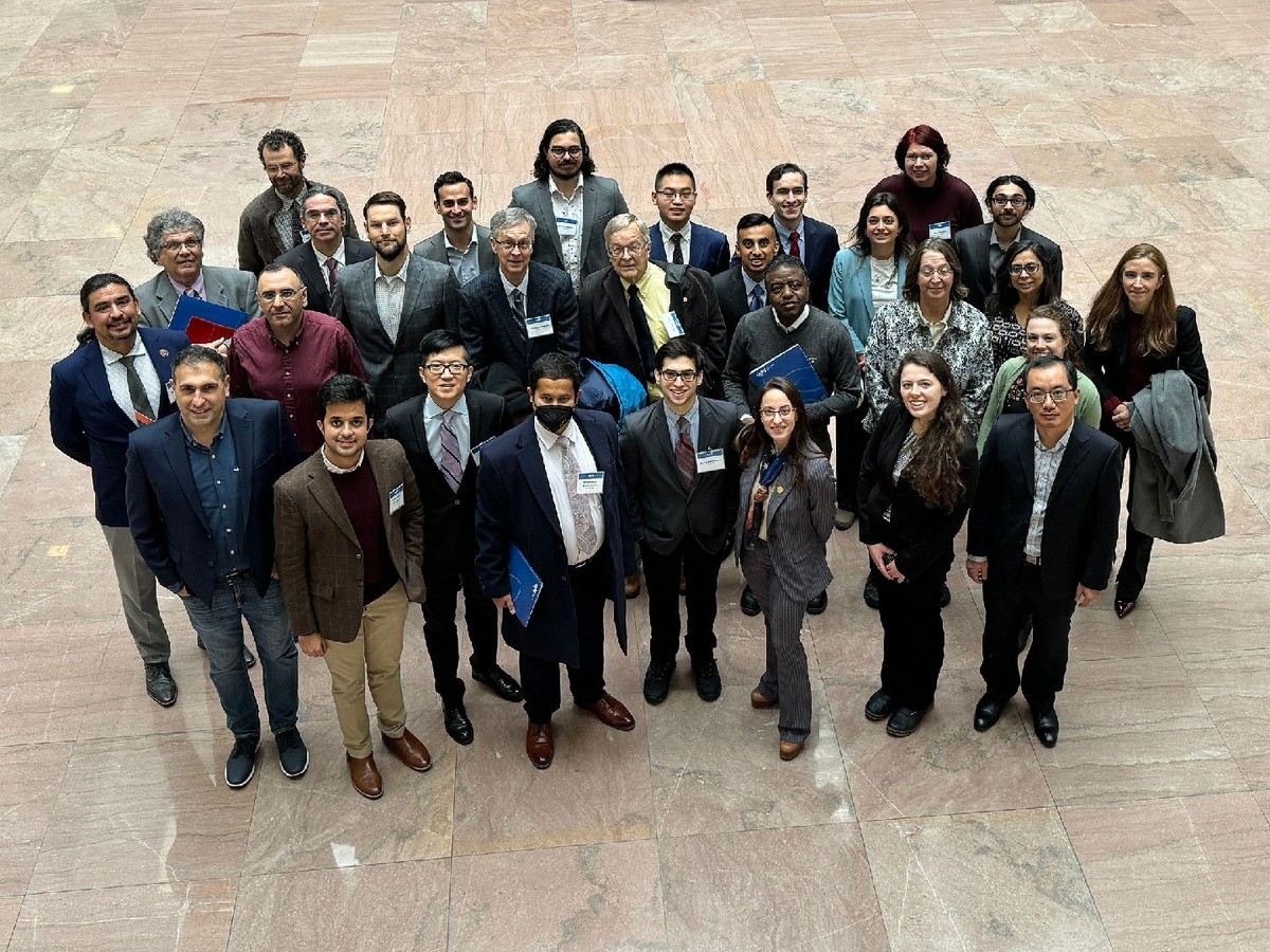 A group of people prepared to meet with legislative staff