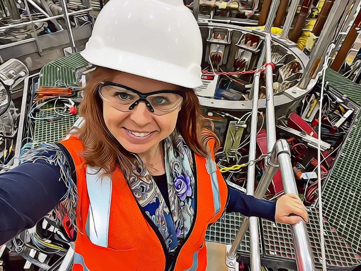 Physicist with white hard hat