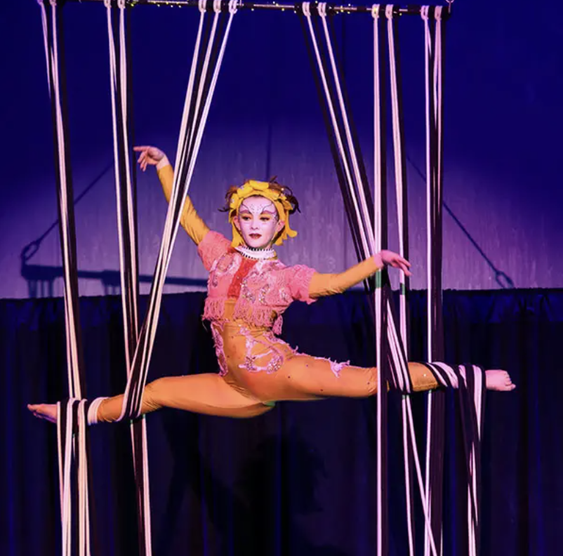 A young performer of Le Petit Cirque